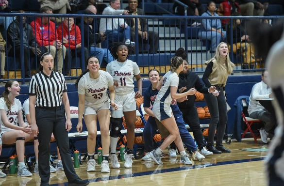 Homewood Lady Patriots celebrate a victory during the regular season. The team enters the Area 5 playoff tournament on an 11 game win streak.